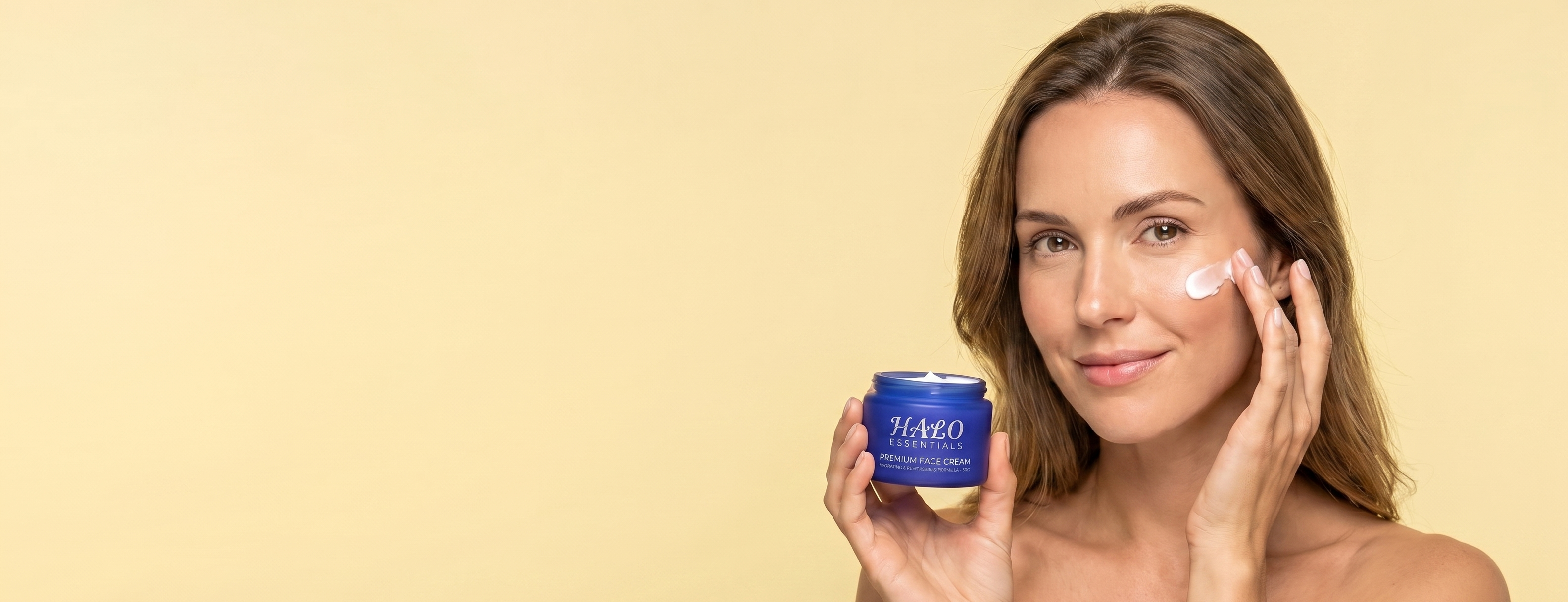 Woman applying Halo Essentials face cream after weight loss
